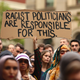 Protesters hold placards as they march during the Stand Against Racism and Islamophobia: Fraser Anning Resign! rally on March 19, 2019 in Melbourne, Australia.